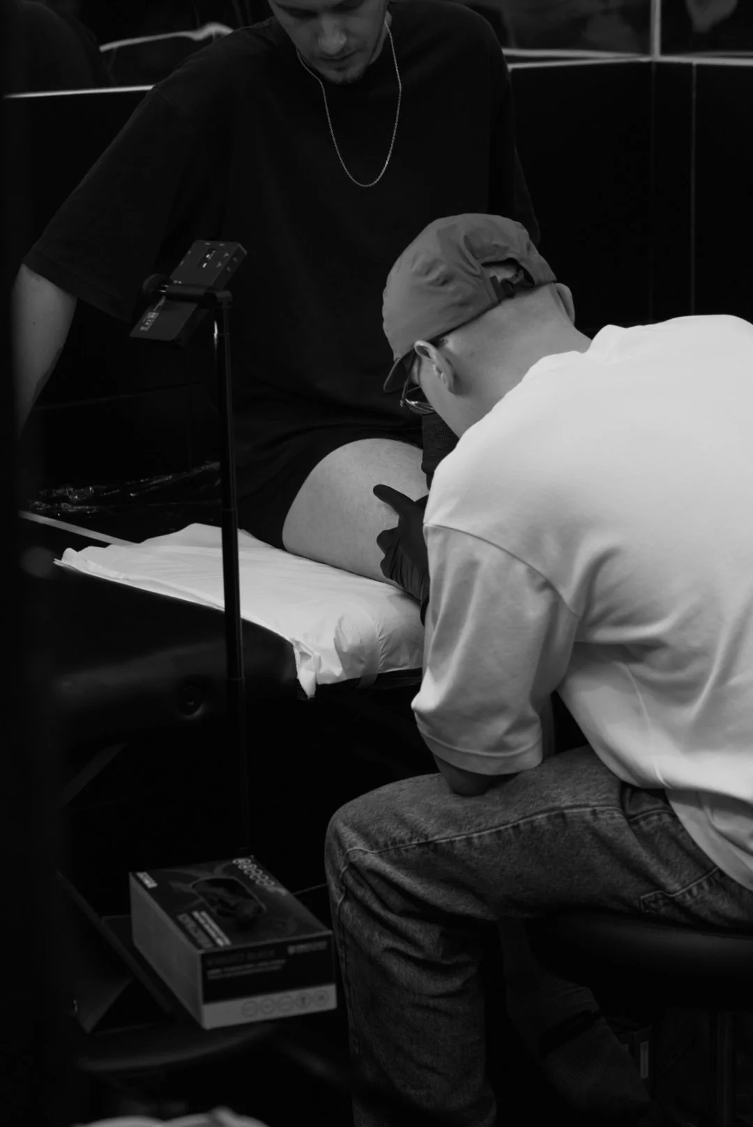Jordan Mitchell tattooing at One by One Tattoo, London